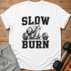 White t-shirt with a snail lifting a barbell, text reads "SLOW BURN".