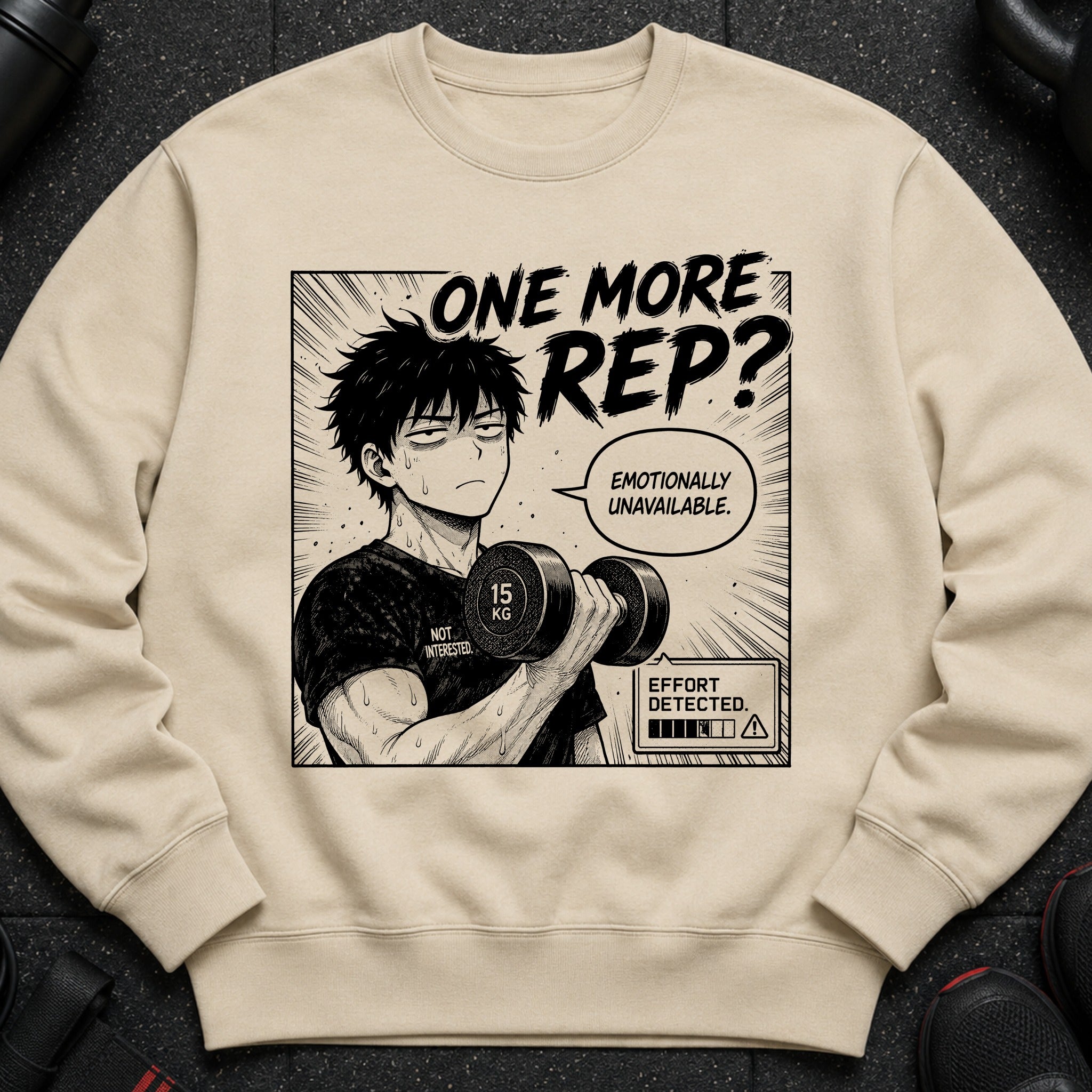 Beige sweatshirt with anime graphic of tired man lifting dumbbell, text "One More Rep? Emotionally Unavailable."