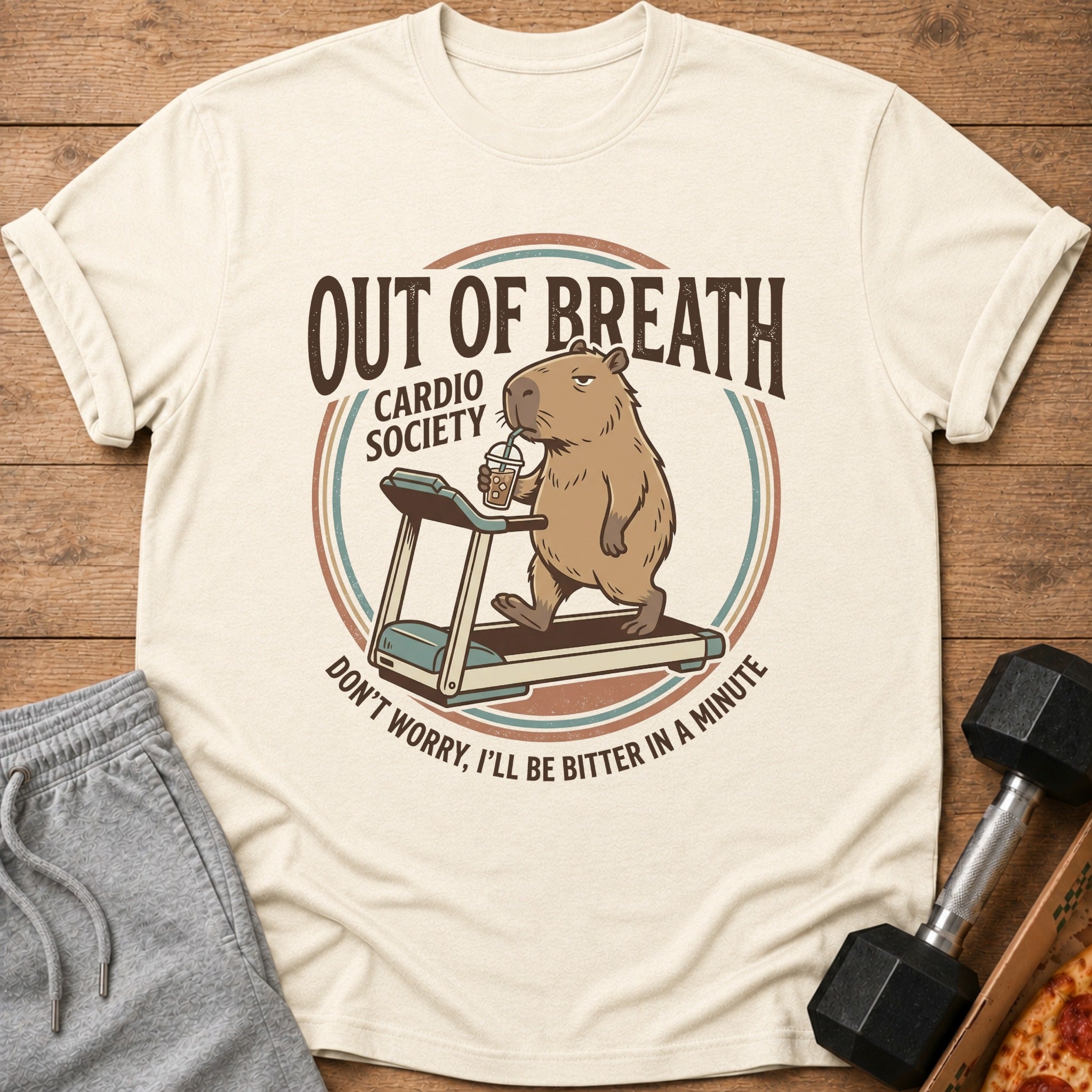 Capybara on treadmill with drink, text "Out of Breath Cardio Society"