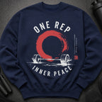 Navy sweatshirt with "ONE REP INNER PEACE" text, barbell, red circle, and emblem.