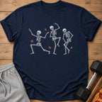 Navy t-shirt with dancing skeletons and falling autumn leaves design.