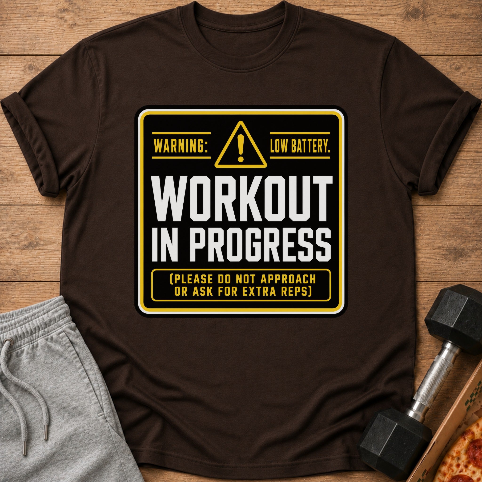 Brown t-shirt with "Workout In Progress" and "Low Battery" warning text.