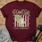 Maroon t-shirt with "Plant Girl Gym Sometimes" text and a frog holding a plant and dumbbell.
