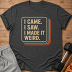 Charcoal t-shirt with retro text "I CAME. I SAW. I MADE IT WEIRD."