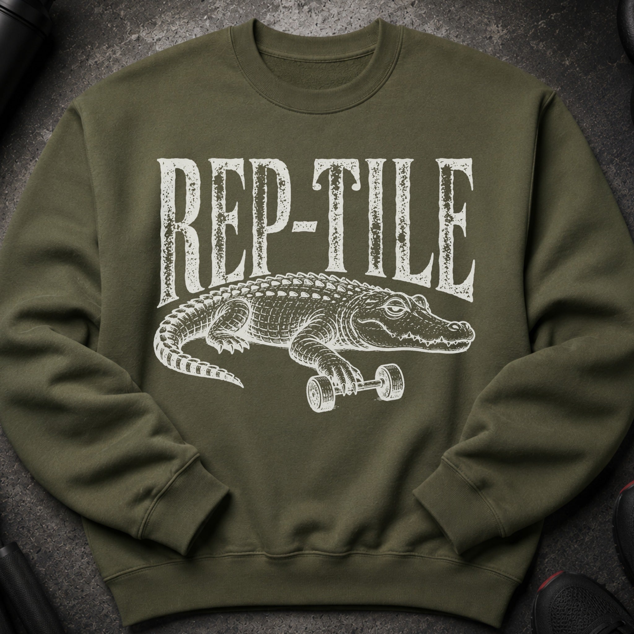 Green sweatshirt with white alligator lifting dumbbells and "REP-TILE" text.