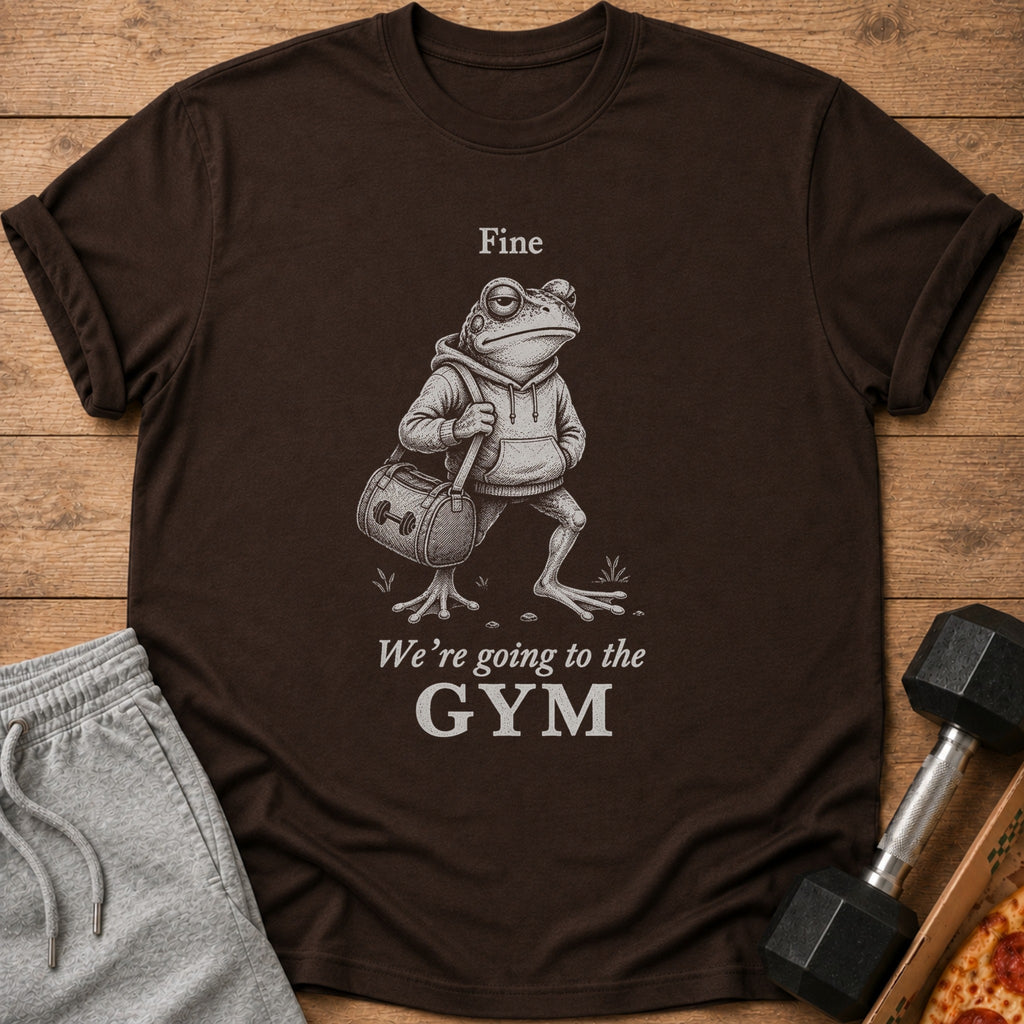 Brown t-shirt with a frog illustration and the text "Fine We're going to the GYM."