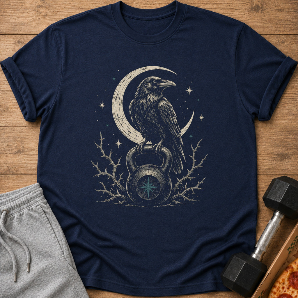 Raven on kettlebell with crescent moon and stars graphic on a navy t-shirt.
