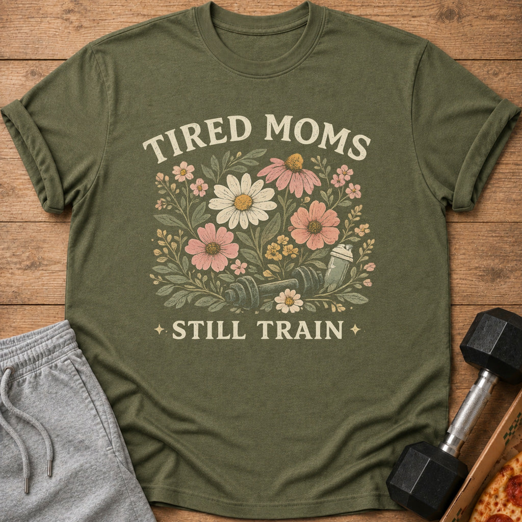 Green t-shirt with "TIRED MOMS STILL TRAIN" text and floral gym shaker design.