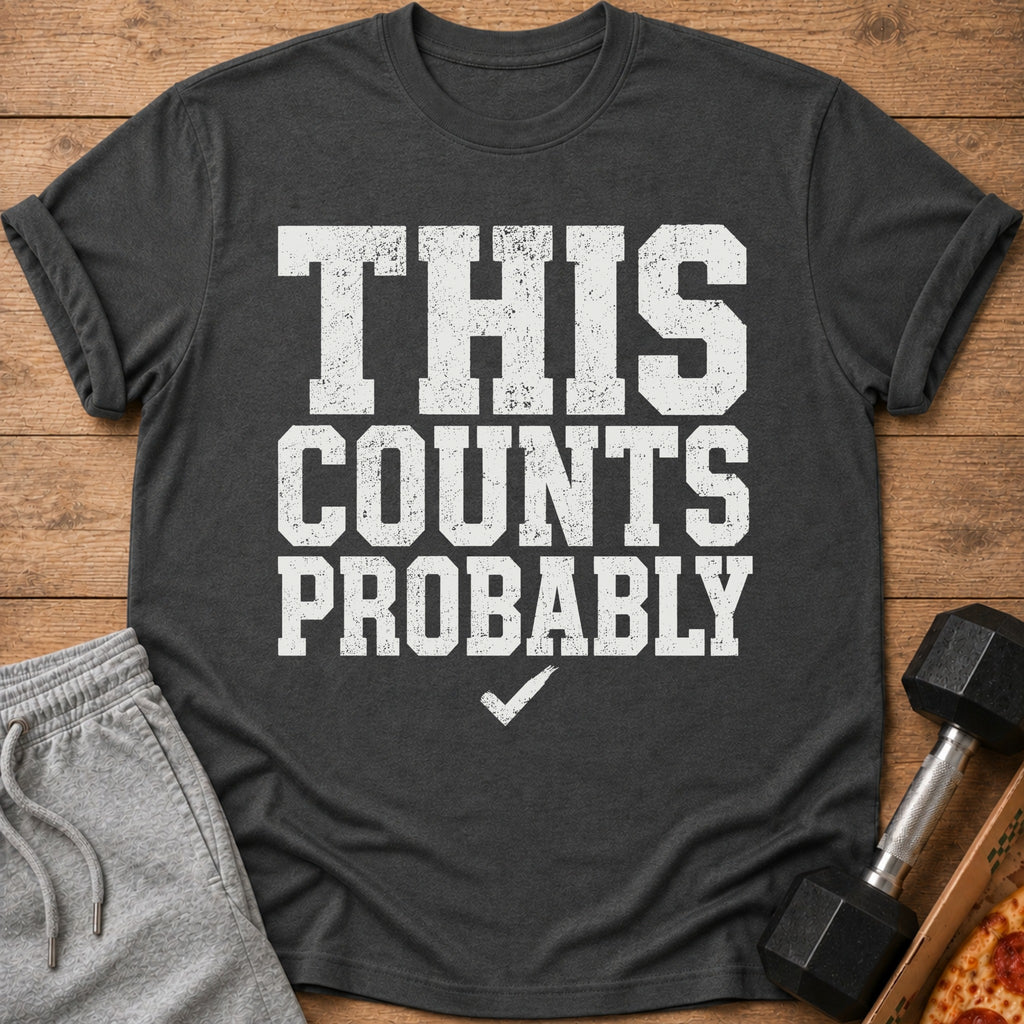 Dark gray t-shirt with white text "THIS COUNTS PROBABLY" and a checkmark.