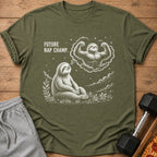 Green t-shirt with a sloth dreaming of a muscular sloth, text reads "FUTURE NAP CHAMP."