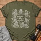 Green t-shirt with a white line drawing of animals and the text "respect the regulars".