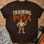Brown t-shirt with "Training For Pizza" text and cartoon of muscular man holding pizza slice.