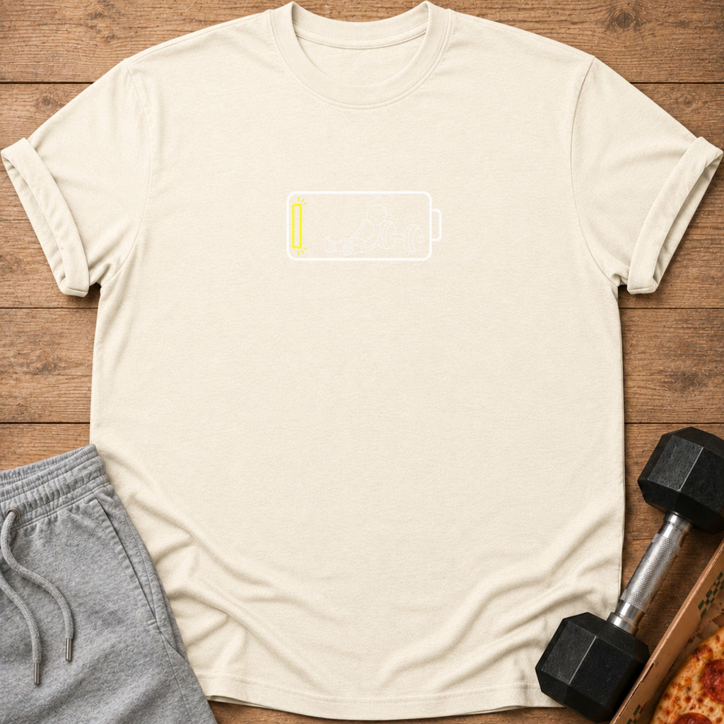 Cream t-shirt with low battery graphic featuring stick figure lifting weights.