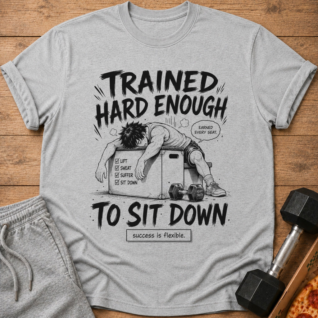 Gray t-shirt with anime illustration of a tired person, text "Trained Hard Enough To Sit Down."