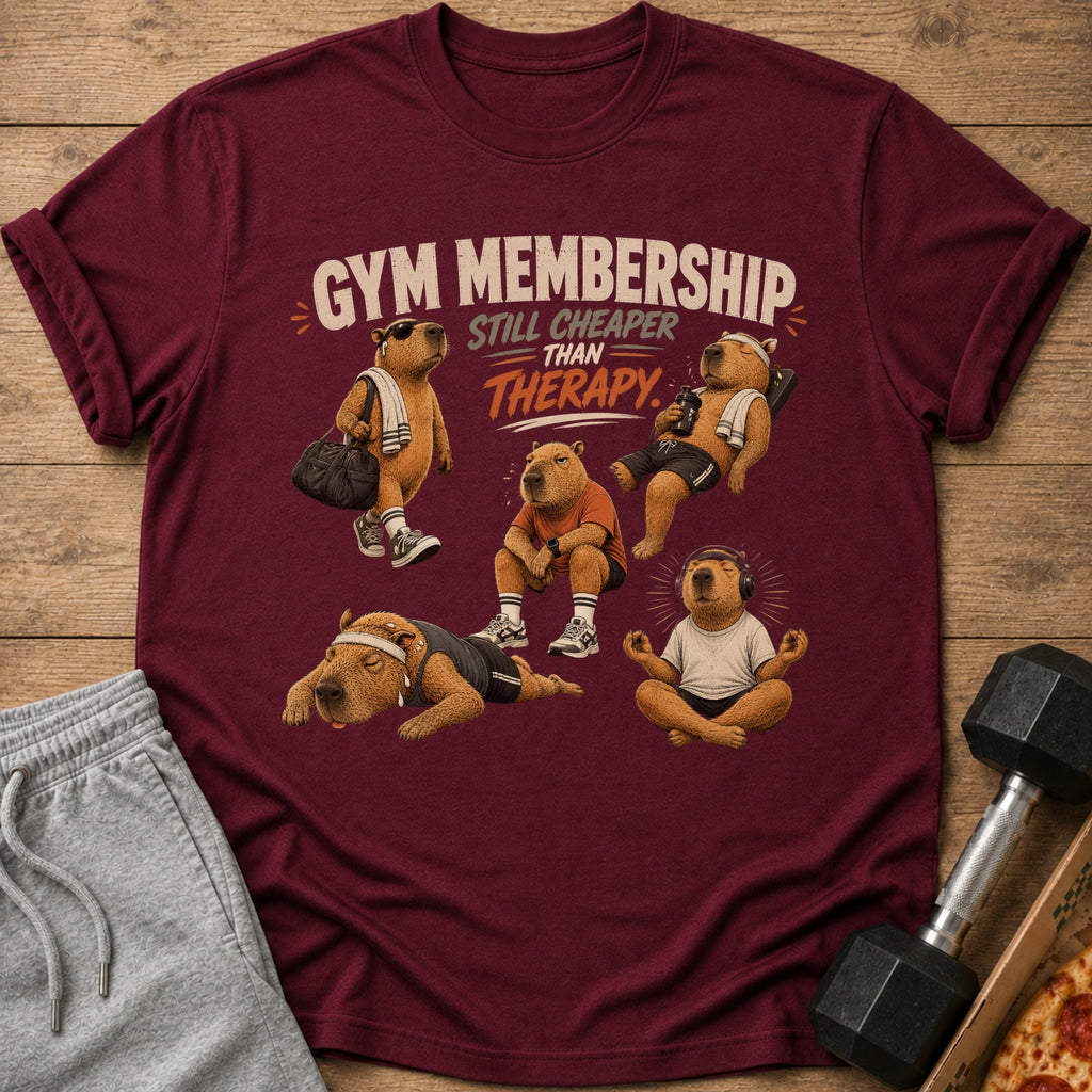 Maroon t-shirt with capybaras exercising and text "Gym Membership Still Cheaper Than Therapy".