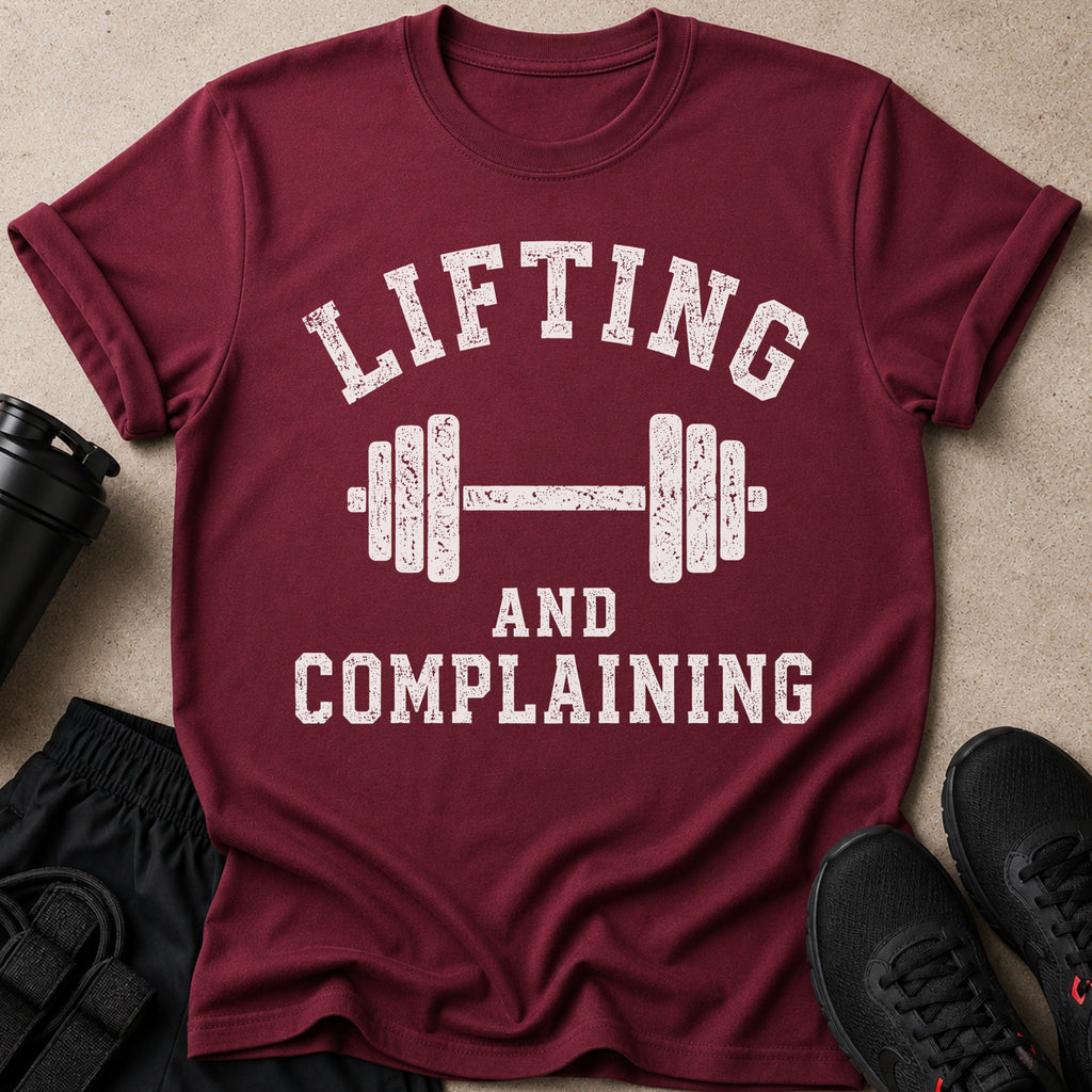 Maroon t-shirt with barbell graphic and text about lifting.