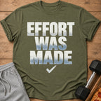 Olive green t-shirt with "EFFORT WAS MADE" text and a checkmark graphic.