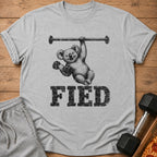 Gray t-shirt with a graphic of a koala lifting weights and the word "FIED".