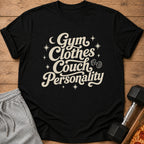 Black t-shirt with "Gym Clothes Couch Personality" text and dumbbell graphic.