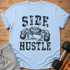 Light blue t-shirt with black distressed text "SIDE HUSTLE" and a crab lifting dumbbells.