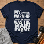 Navy t-shirt with "MY WARM-UP WAS THE MAIN EVENT." graphic.