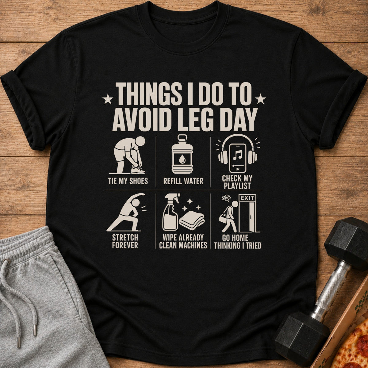Black t-shirt with white text and graphics about avoiding leg day.