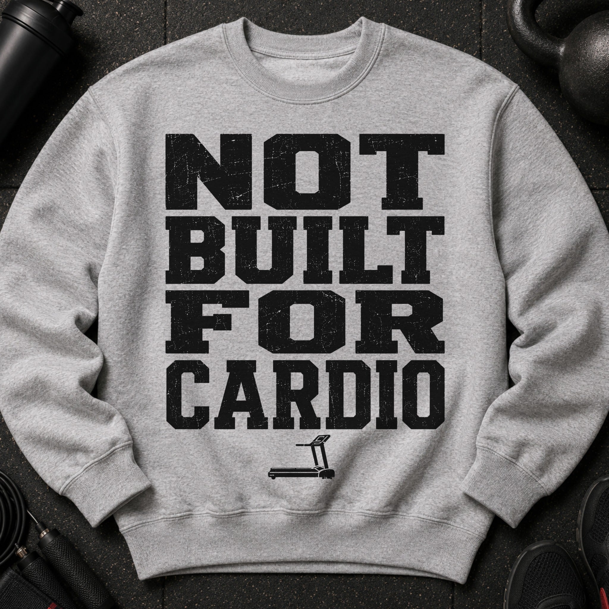 Grey crewneck sweatshirt with "Not Built For Cardio" text and a treadmill graphic.