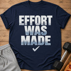 Navy t-shirt with white text "EFFORT WAS MADE" and a checkmark.