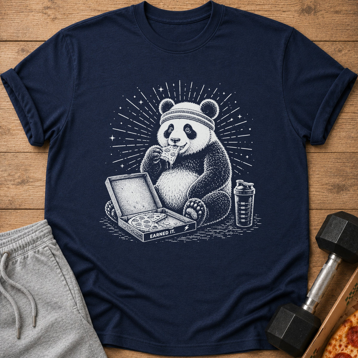 Navy t-shirt with a graphic of a panda eating pizza and a shaker bottle.