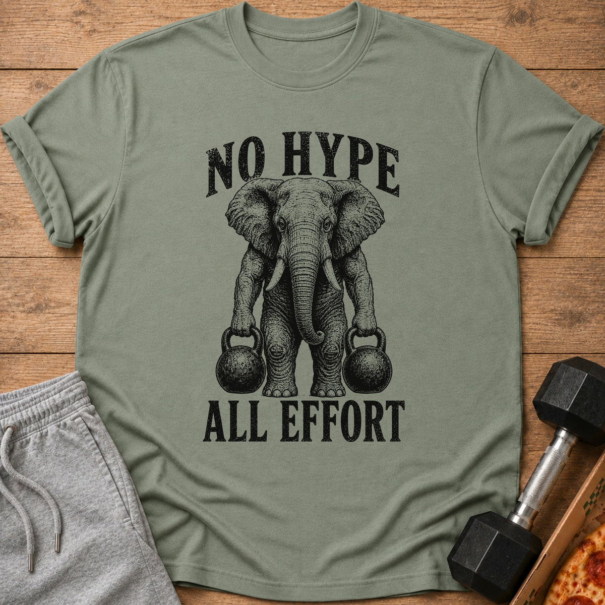 T-shirt with elephant holding kettlebells and text "NO HYPE ALL EFFORT".