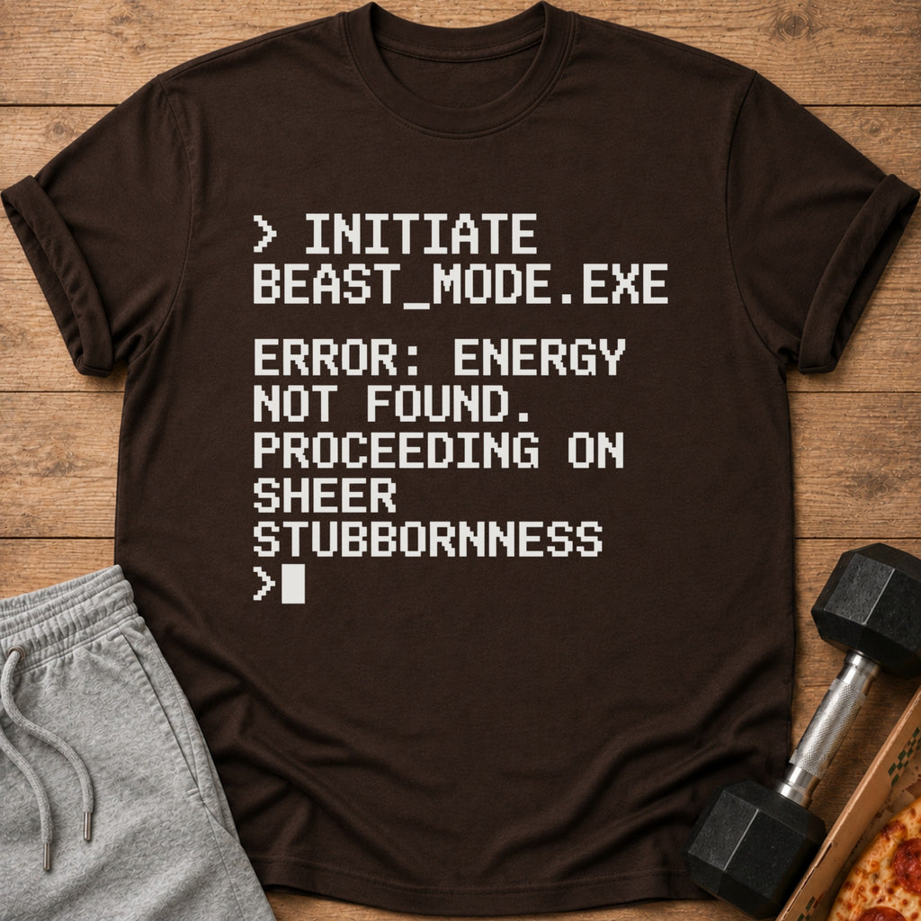 Brown t-shirt with white pixelated text: "Initiate beast_mode.exe Error: energy not found. Proceeding on sheer stubbornness"