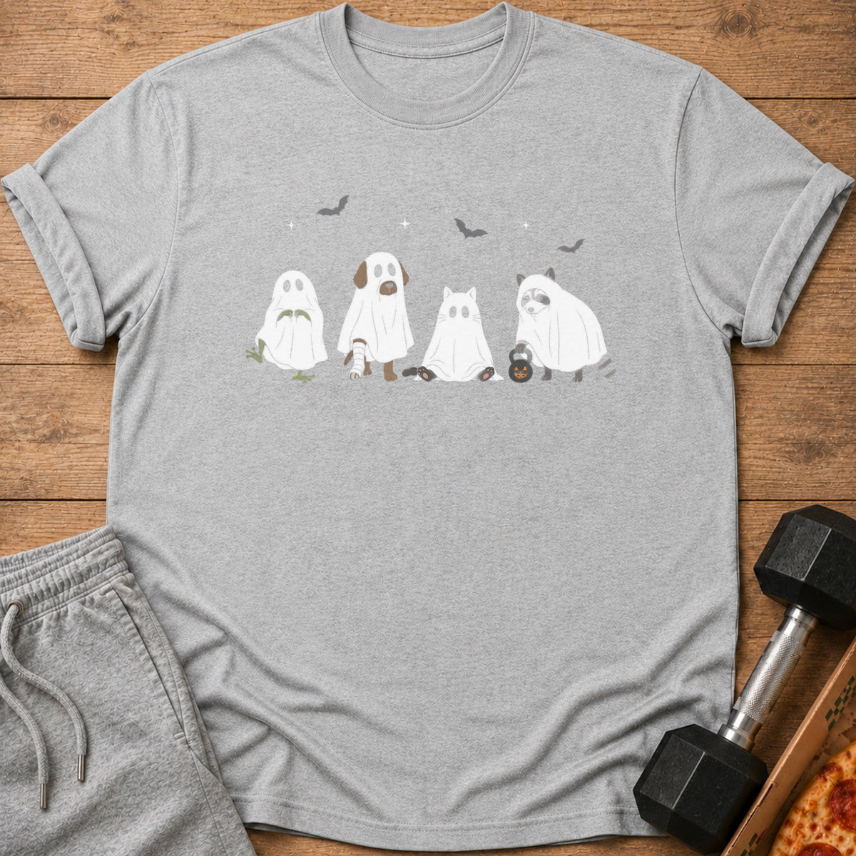 Gray t-shirt with cartoon animals in ghost costumes and Halloween bats.