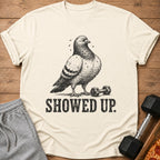 T-shirt with distressed print of a pigeon, dumbbell, and text "SHOWED UP."