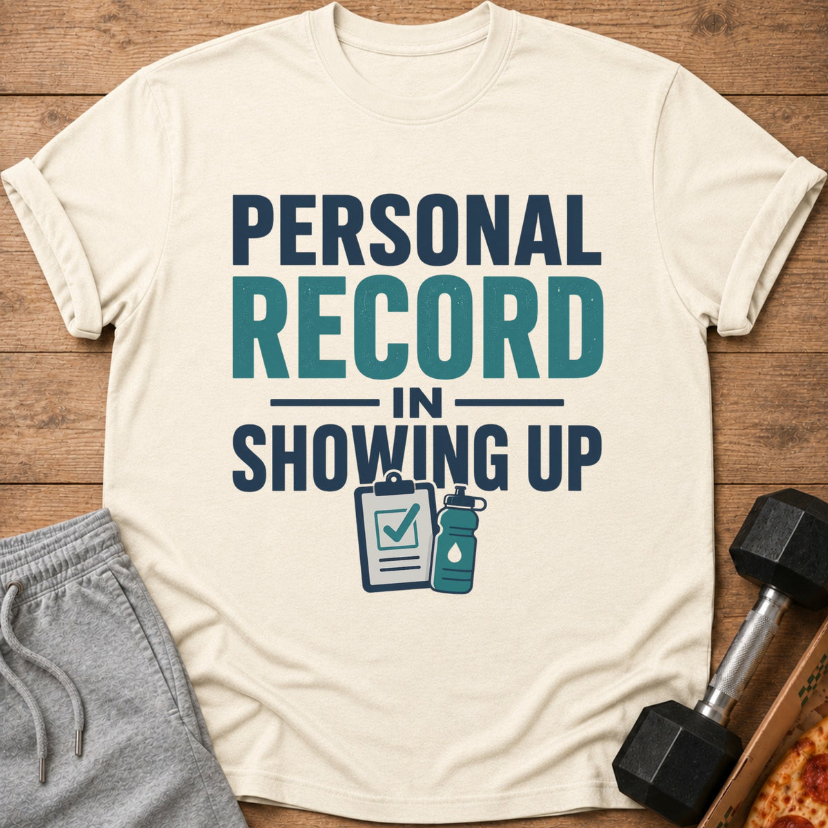T-shirt with "Personal Record in Showing Up" text and fitness icons.