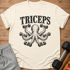 T-shirt with distressed octopus lifting dumbbells and text "TRICEPS".