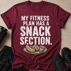 Maroon t-shirt with "My Fitness Plan Has A Snack Section" text and snacks.