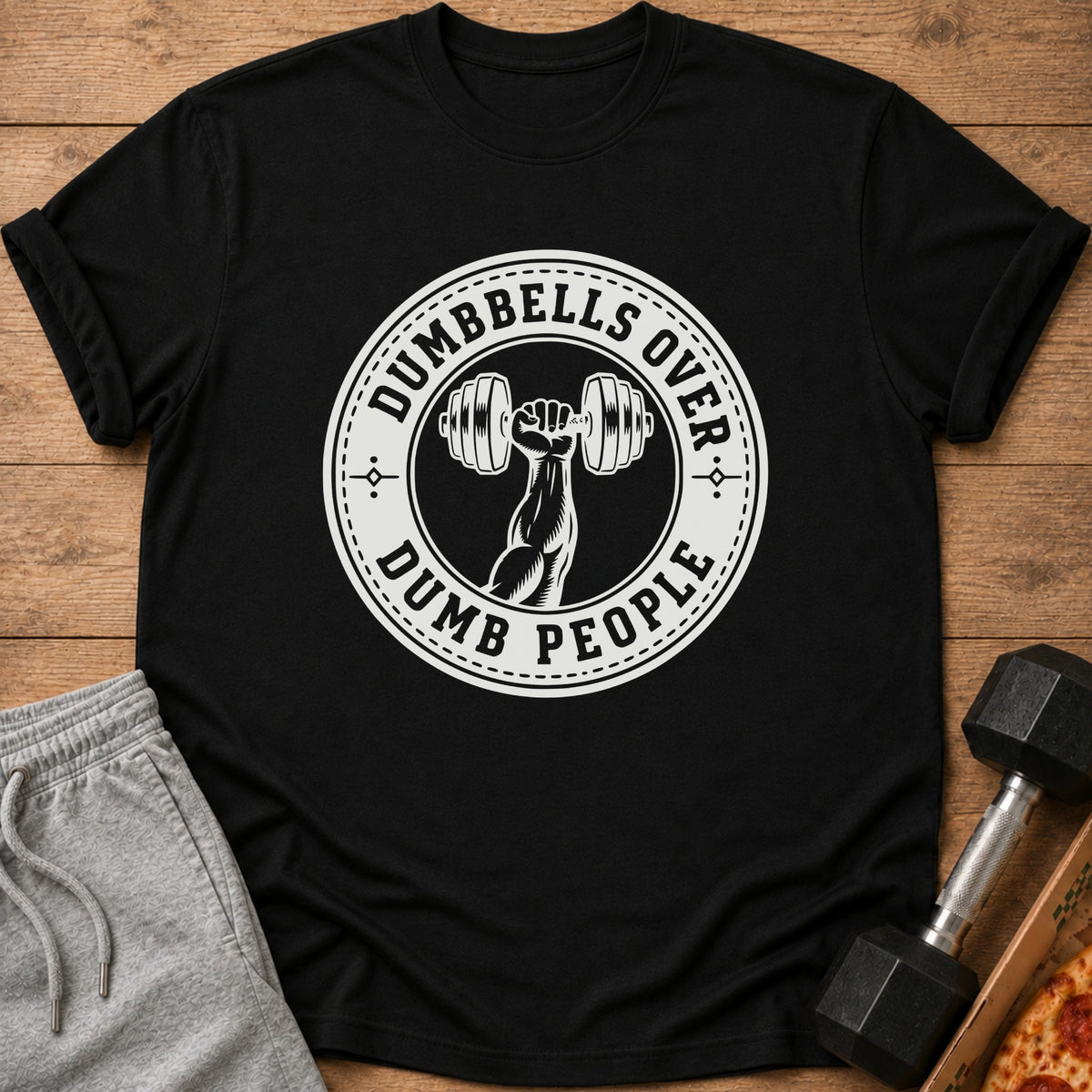 Black t-shirt with white circular graphic of a weightlifter's arm holding a dumbbell.