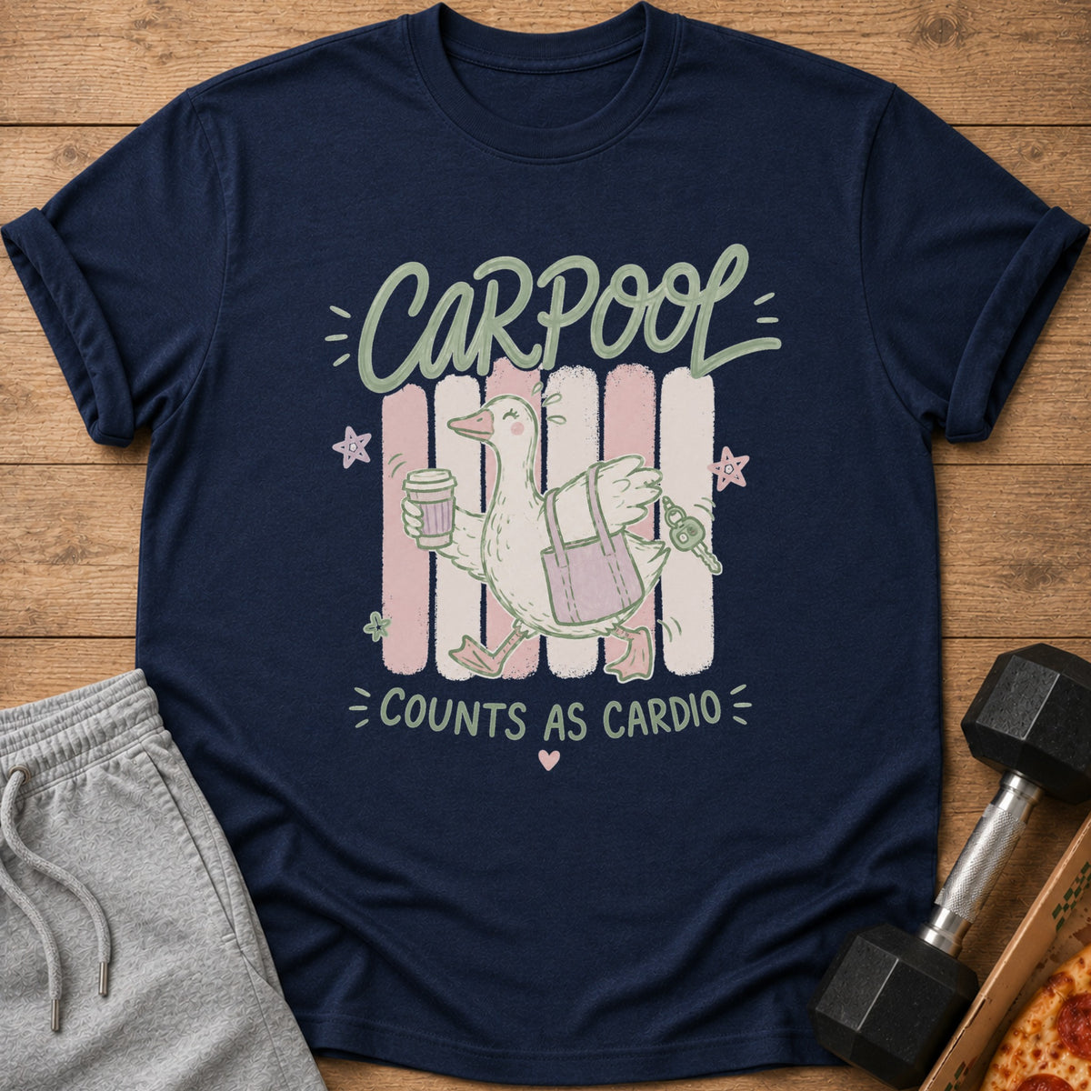 Navy t-shirt with graphic of duck carrying coffee, bag, and keys, says "CARPOOL COUNTS AS CARDIO".