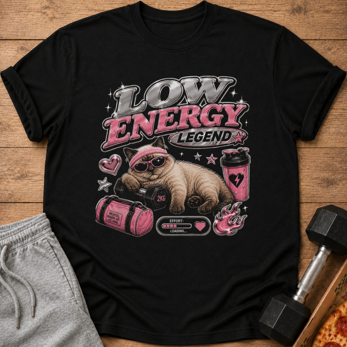 Cat wearing sunglasses and headband rests on dumbbell with "Low Energy Legend" text.
