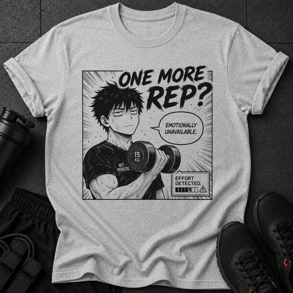 Gray t-shirt with anime-style graphic of a man lifting weights, text says "ONE MORE REP?"