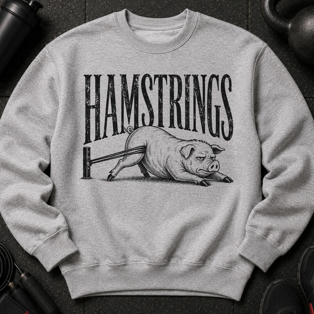 Gray sweatshirt with black text "HAMSTRINGS" and a pig doing leg curls.