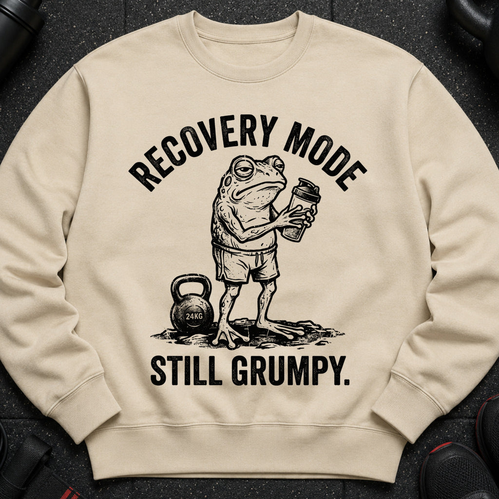 Cream sweatshirt with a grumpy frog holding a shaker, "RECOVERY MODE" above and "STILL GRUMPY." below.