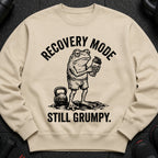Cream sweatshirt with a grumpy frog holding a shaker, "RECOVERY MODE" above and "STILL GRUMPY." below.