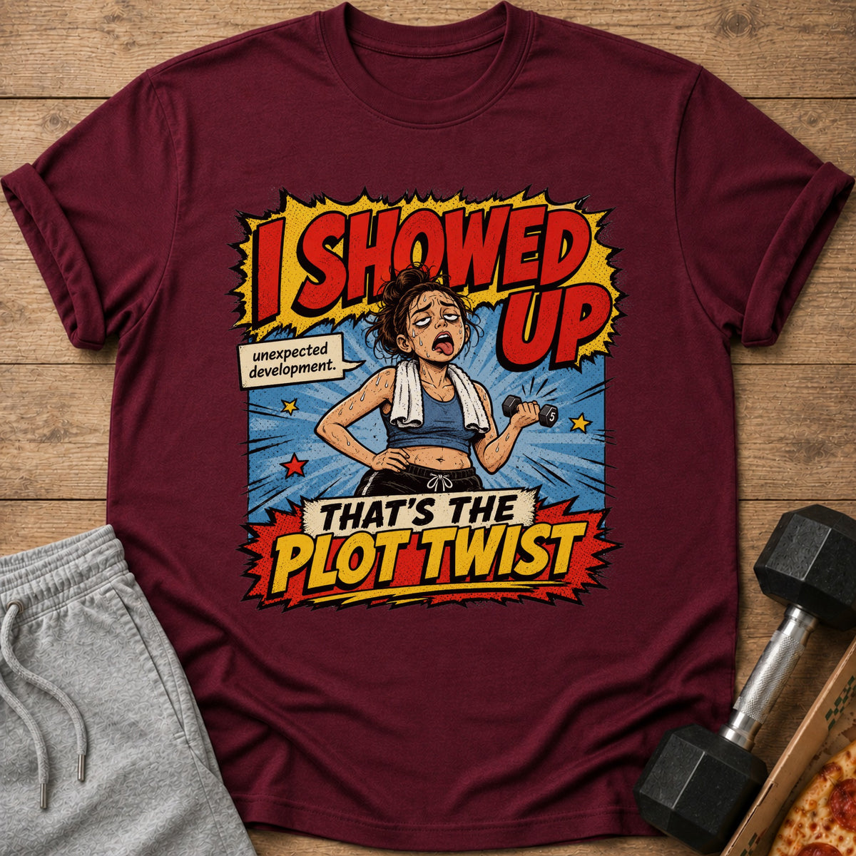 Maroon t-shirt with graphic "I showed up. That's the plot twist."