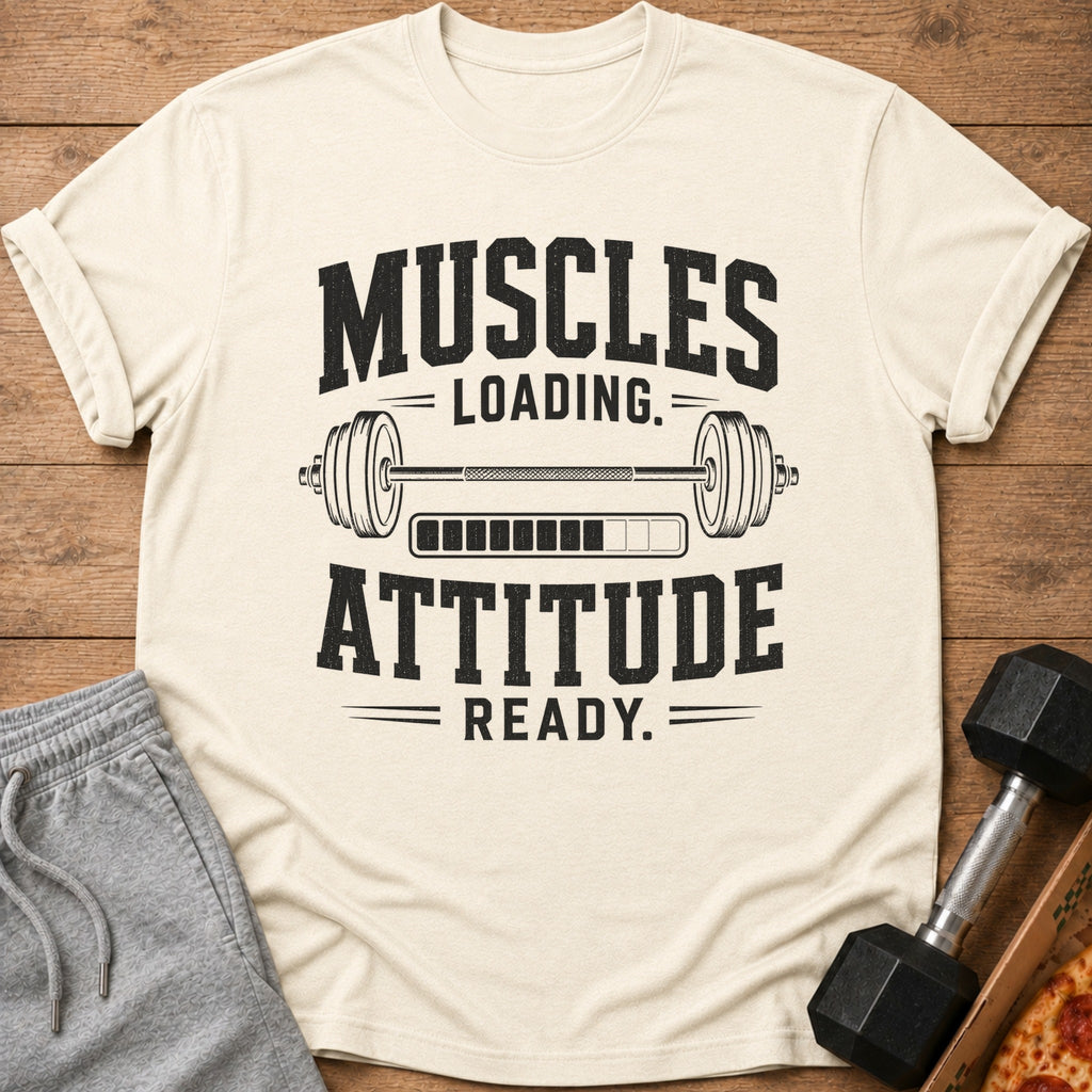 Cream t-shirt with "MUSCLES LOADING. ATTITUDE READY." text and barbell graphic.