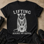 Black t-shirt with vintage distressed graphic of a badger lifting a kettlebell.