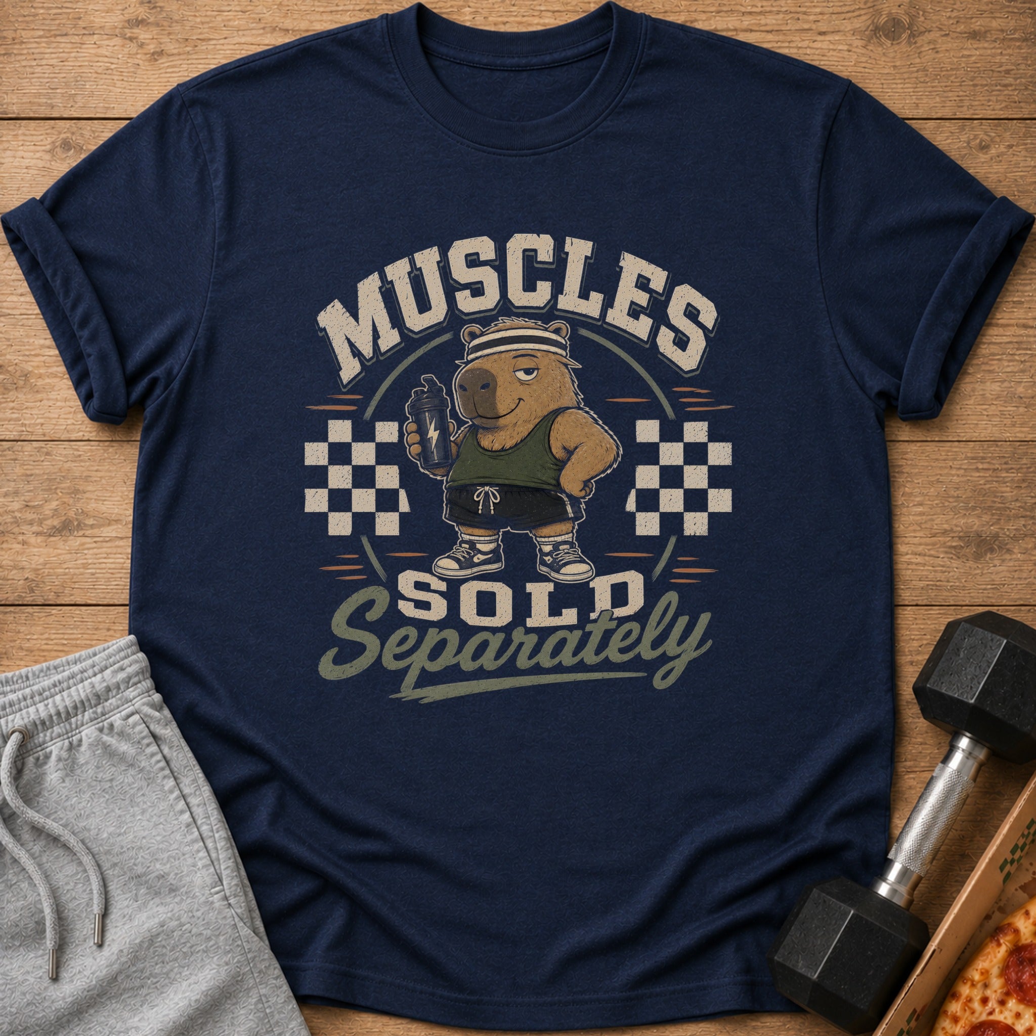 Navy t-shirt with "Muscles Sold Separately" text and a capybara holding a shaker bottle.