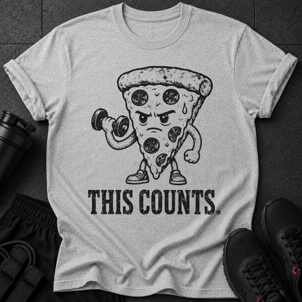 Grey t-shirt with cartoon pizza lifting dumbbell and text "THIS COUNTS."