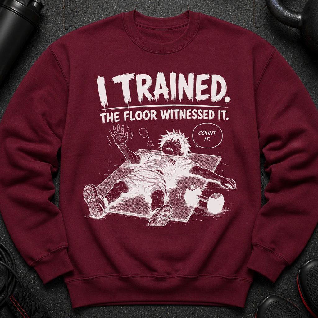 Maroon sweatshirt with "I TRAINED. THE FLOOR WITNESSED IT. COUNT IT." comic graphic.