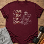 Maroon t-shirt with text "I Came. I Saw. I Sat Down." and a sloth on a bench.